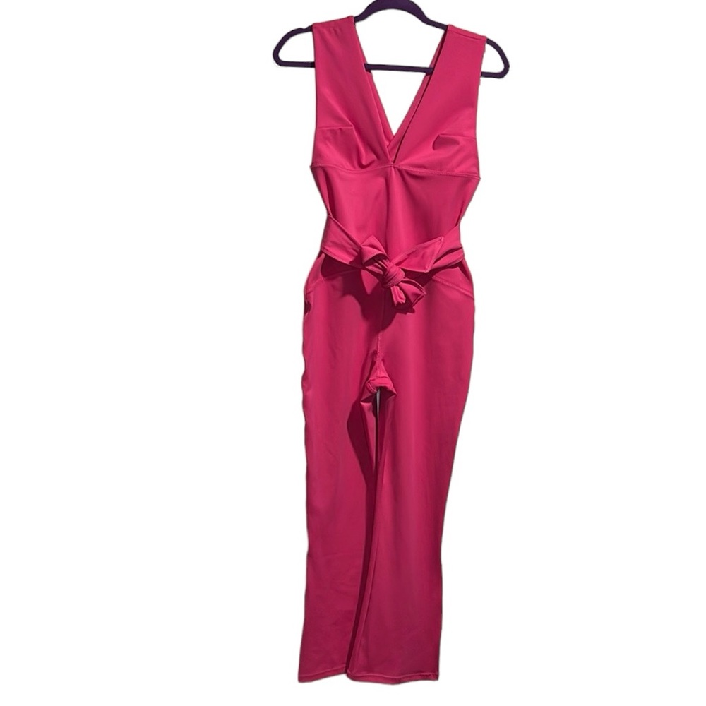 Free People Movement festival fuschia Jumpsuit Medium NWT